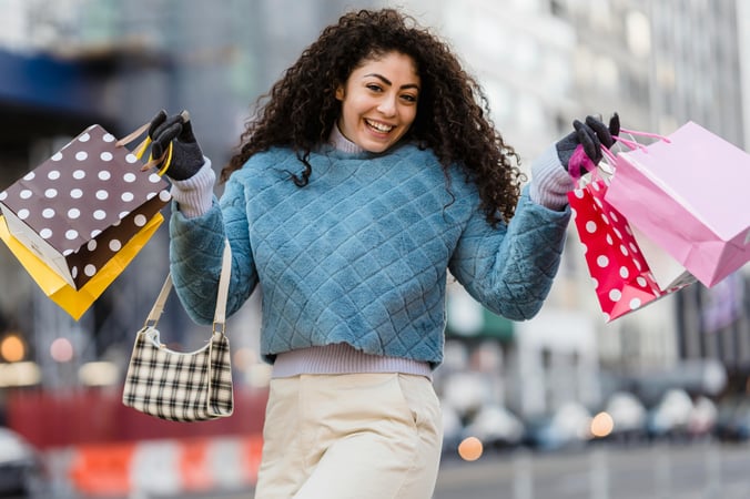 women with shopping bags