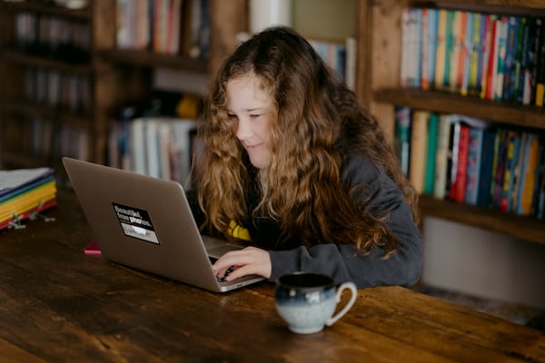 student using laptop