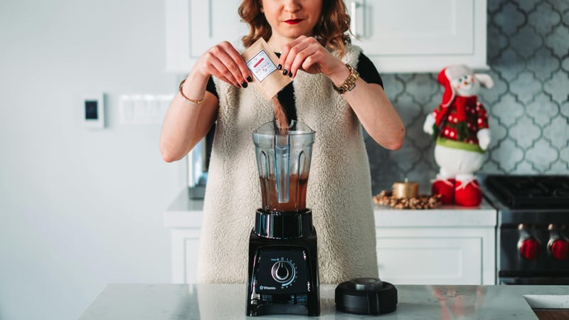 Women operating Blender