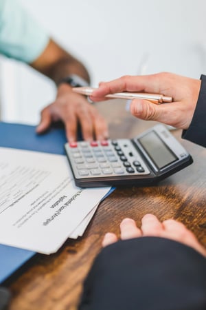 Accounting desk with calculator